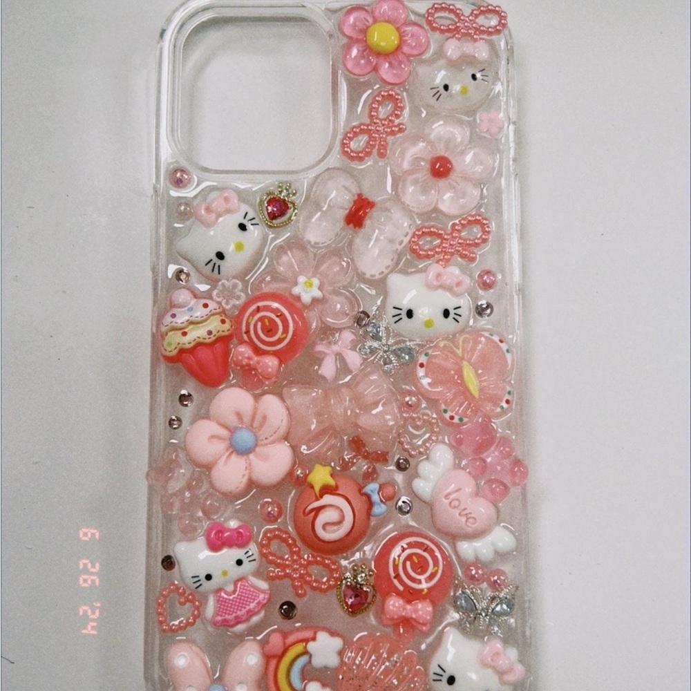 Hello kitty junk case available for all iPhone including Samsungs ETC